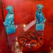 A Oriental Cinnabar lacquered box of circular form together with two blue glazed Chinese Kylin
