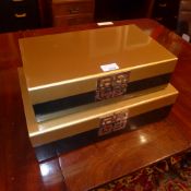 A pair of Oriental style boxes with metal mounts