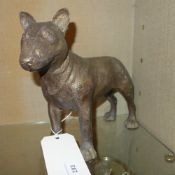 A bronze of a pitbull terrier