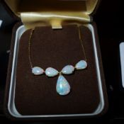 A 9ct gold and opal necklace approximately weight of stones 4 ct