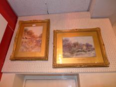A pair of Leyton Forbes watercolours, one study of cottage the other of a flowering garden both