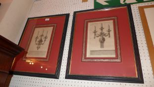 A pair of C19th engravings of girandoles glazed and framed