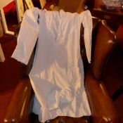 A French linen chemise together with a collection of night caps from a monastery
