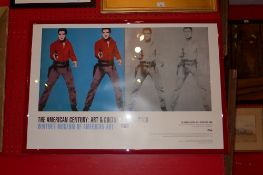 A glazed and framed Andy Warhol exhibition poster