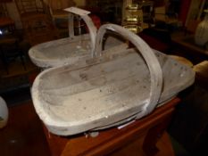 A pair of wooden trugs