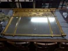 A Regency giltwood overmantle mirror the carved classical design frieze above triple bevelled