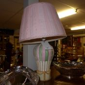 An Italian porcelain balloon form table