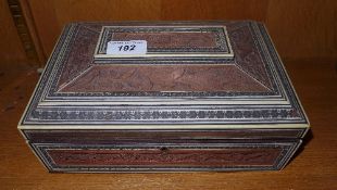 An Indian hardwood carved work box with