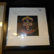 A signed Guns and Roses framed CD album cover