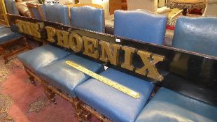 A wooden pub sign 