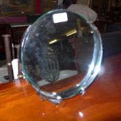 An early chrome bevelled circular dressing mirror