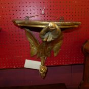 A pair of aesthetic movement gilt wood L