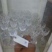 A collection of faceted drinking glasses