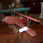 A wooden model biplane