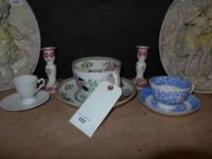A Minton porcelain oversized tea cup and saucer, a pair of dwarf candlestick and others
