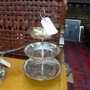 A silver plated three tier candlestick a