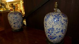A pair of porcelain ginger jar form tabl