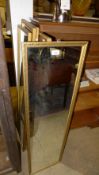 A set of five wall mirrors within gilt f
