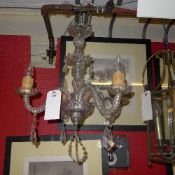 A four branch cut glass chandelier with