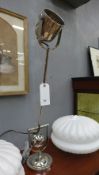 An Art Deco design chrome counterweight