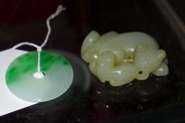 A Chinese jade carving and a jade pendant