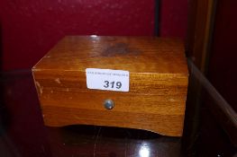 A Swiss music box 'Two Hearts in Waltz Time, Marcheta, Student Prince'.