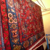 A fine north west Persian Nahawand rug, 202 x 135cm, central pole medallion on a rouge field
