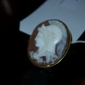 A Victorian yellow metal (test as 14ct gold) cameo brooch with a portrait of Athena