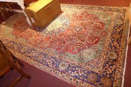 An extremely fine north west Persian Tabriz carpet, 330cm x 22cm, central floral sapphire