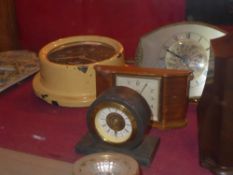 A collection of four clocks including a cream painted example 'The Gosselin's'
