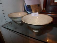 A pair of Chinese Ding ware design bowls with incised floral decoration