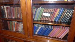 A collection of various hardback books