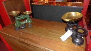 Two sets of grocers scales and some weights