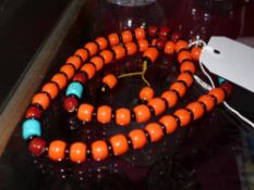 A coral beaded necklace