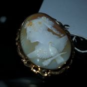 A Victorian yellow metal (tests as 9ct gold) cameo brooch with a portrait of Aphrodite