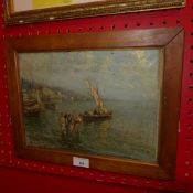 An oil on canvas coastal study with figures wading to shore from a boat signed bottom left