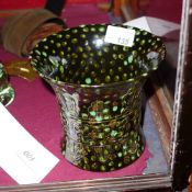 A Chinese brush pot decorated in a black and green mottled glaze