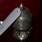 A Tibetan white metal scroll container