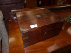 A mahogany brass bound writing slope and one other