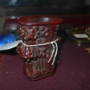 A simulated horn libation style cup