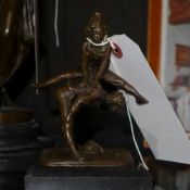 A bronzed figure of children playing  leapfrog