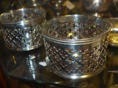 A pair of silver plated coasters