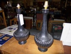 A pair of black porcelain table lamps