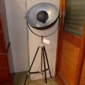 A large floor standing studio lamp