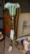 An Arts and Crafts brass adjustable head table lamp with vaseline shade