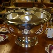 A silver plated eleven bottle wine/champagne cooler