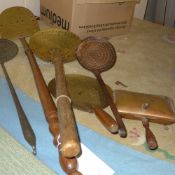 A collection of vintage skimmers/sieves