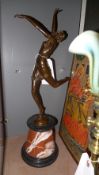 A bronze cast of an Art Deco dancer on marble base