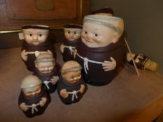 A collection of Goebel German porcelain figures in monks costume
