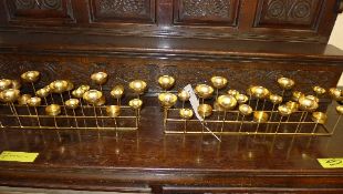 A pair of gilded metal multi holder church votive's